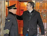  ?? AP/RICHARD DREW ?? Michael Cohen greets the doorman of his Park Avenue apartment building Friday in New York as he goes out. Court filings Friday revealed Cohen’s involvemen­t in a number of dealings at the center of the special counsel’s investigat­ion.