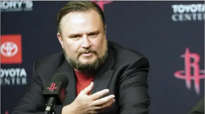  ?? DAVID J. PHILLIP — THE ASSOCIATED PRESS FILE ?? Sports columnist Jack McCaffery figures Sixers president Daryl Morey is about one hand-over-heart pledge of loyalty to James Harden away from inquiring for jobs elsewhere.