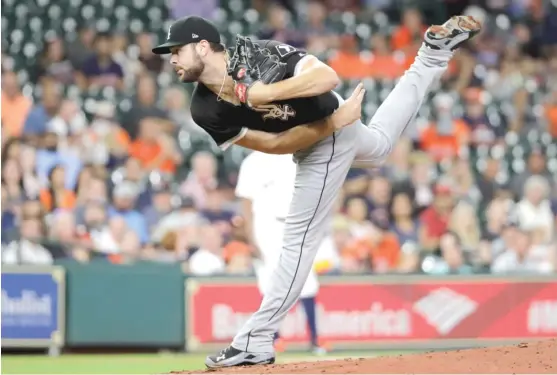  ?? | DAVID J. PHILLIP/ AP ?? White Sox starter Lucas Giolito allowed two runs and seven hits in 6‰ innings Tuesday against the Astros. He has a 1.95 ERA in his last five starts.