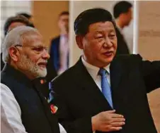  ?? REUTERS PIC ?? Indian Prime Minister Narendra Modi’s recent meeting with China President Xi Jinping recently.
Both expect bilateral ties to improve.