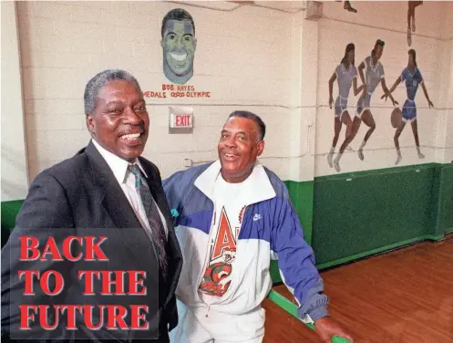  ?? M. JACK LUEDKE/FLORIDA TIMES-UNION ?? Former Olympic double-gold medal winner and NFL Hall of Famer Bob Hayes, left, seen here with his former Matthew Gilbert Junior/Senior High School coach Earl Kitchings in 1996, was ranked No. 1 on the Times-Union 1999 list of Greatest Athletes from the Jacksonvil­le area. When the updated rankings are revealed in the next two months, many will be interested to see if Hayes, who died in 2002, holds on to No. 1.