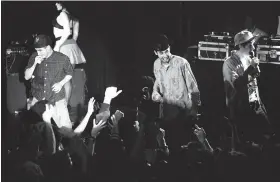  ?? Deanne Fitzmauric­e / The Chronicle 1987 ?? The Beastie Boys, on the verge of a world tour and platinum popularity, perform in San Francisco at the small club Wolfgang’s in 1987.