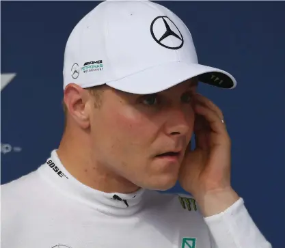  ?? FOTO: LEHTIKUVA/ATTILA KISBENEDEK ?? Valtteri Bottas har en lång väg till prispallen i Belgien.