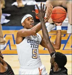  ?? GERRY BROOME/AP ?? Georgia Tech forward Moses Wright (5) developed into the ACC player of the year in 2020-21, ranking in the top six in the conference in scoring, rebounds, field-goal percentage, steals, blocked shots and minutes.