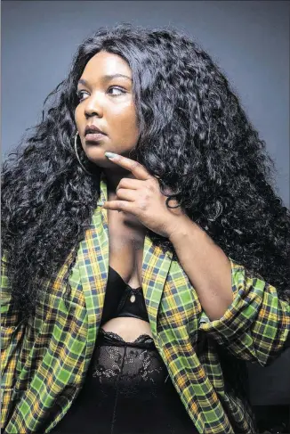  ?? TAMIR KALIFA/AMERICAN-STATESMAN ?? With fierce rhyme skills and positive vibes, Minneapoli­s rapper Lizzo is one of the hottest artists at SXSW 2017.