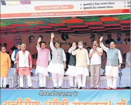  ?? HT PHOTO ?? Defence minister Rajnath Singh and chief minister Pushkar Singh Dhami and other top BJP leaders attend an event in Pauri Garhwal on Friday.