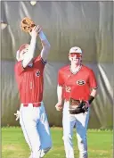  ?? Barbara Hall ?? A Sonoravill­e infielder waits for a pop-up to come down in a recent victory for the team. The Phoenix began their Region 7-4A schedule last week by taking two out of three games against Northwest Whitfield County.