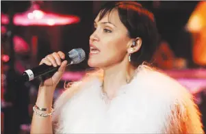  ?? CP PHOTO ?? Susan Aglukark performs during the Canadian Aboriginal Music Awards on Nov. 24, 2006, in Toronto. Some nights, Aglukark still wakes up drenched in sweat. It’s been 42 years since the acclaimed Inuk singer endured sexual abuse, including being...