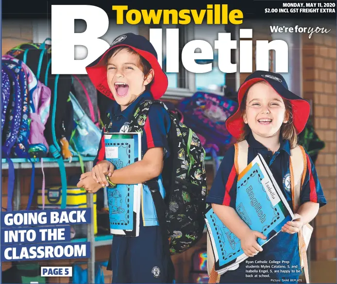  ?? Picture: SHAE BEPLATE ?? Ryan Catholic College Prep students Myles Catalano, 5, and Isabella Engel, 5, are happy to be back at school.