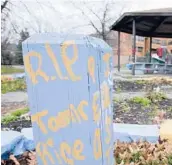  ?? TONYDEJAK/AP ?? In this 2015 photo,“R.I.P. Tamir Rice”is written on a post near a makeshift memorial where the boy was fatally shot, outside the Cudell Recreation Center in Cleveland.