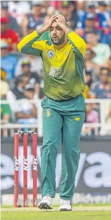  ?? /Seshibedi/ Gallo Images ?? Knock and drop: Tabraiz Shamsi reacts after Virat Kohli was dropped when the India skipper was on 10 . But Shamsi got Kohli leg before wicket for 26.