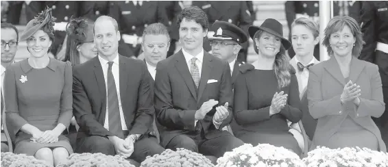  ?? ADRIAN LAM, TIMES COLONIST ?? Prince William and Kate, with Prime Minister Justin Trudeau and his wife, Sophie Grégoire Trudeau, and Premier Christy Clark at Saturday’s welcoming.