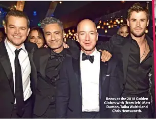  ??  ?? Bezos at the 2018 Golden Globes with (from left) Matt Damon, Taika Waititi and Chris Hemsworth.