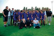  ??  ?? (Below) The world at their feet: Ayanda Patosi (second row, firstf from left) wuth his teammates and coaches at the ASD Academy.