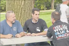  ?? Lori Van Buren / times union ?? Assembly candidate don Boyajian, center, meets with marc Cesta, left, and edward nadeau on friday in Albany.