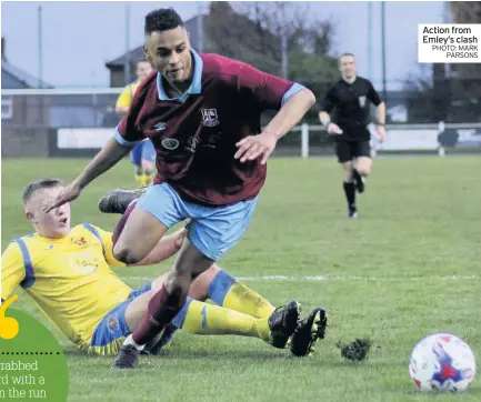  ??  ?? Martin Eastwood
Action from Emley’s clash PHOTO: MARK
PARSONS