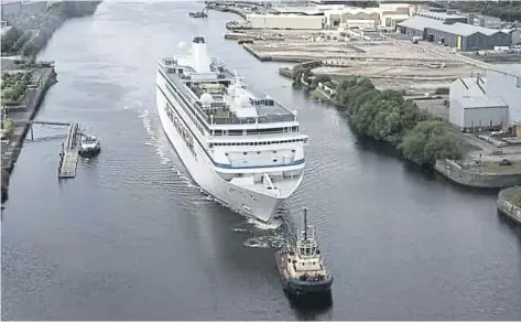  ?? ?? MS Ambition arriving into Glasgow to house Ukrainian refugees in 2022. A second cruise ship, MS Victoria, was docked in Leith to serve the same purpose