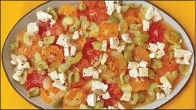  ?? (TNS/Los Angeles Times/Ben Mims) ?? Feta, celery and green olives add just the right amount of saltiness to a salad of sweet orange citrus.