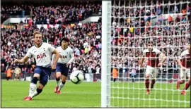  ??  ?? THAT’S THE SPOT: He nets a penalty against the Gunners in March