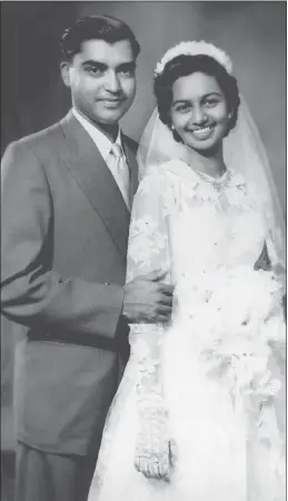  ??  ?? Leslie and Emily on their wedding day.