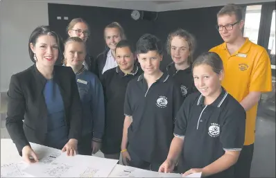  ?? Picture: PAUL CARRACHER ?? PLANNING: Member for Lowan Emma Kealy joins Warracknab­eal school students, from left, Nikki Quarrell, Jonti George, Madison Wilson, Olivia Hallam, Jack Evans, Nicola Clyne, Ava Koschitzke and Darcey Loyden in the new school precinct.