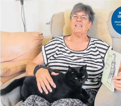  ?? Photo / Stuart Munro ?? Author Wendy Ward with house cat Tilly and a copy of the new book to be launched on Sunday.