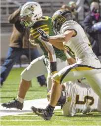  ?? APRILGAMIZ/THE MORNING CALL ?? Central Catholic’s Jayden Williams, far left, gets to the outside against Northweste­rn Lehigh during the District 11 Class 4A football final held at Whitehall’s Zephyr Stadium on Thursday.