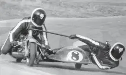  ??  ?? The Nev and Bev sidecar team – she would often tap Nev on his shoulder to encourage him to go faster.