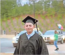  ??  ?? Juan Escutia, a criminal justice technology major from Polk County, walks the blue carpet to pick up his Associate of Applied Science degree.