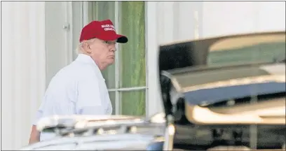  ?? [ANDREW HARNIK/THE ASSOCIATED PRESS] ?? President Donald Trump arrives at the White House on Sunday after playing golf at Trump National Golf Club in Sterling, Va.