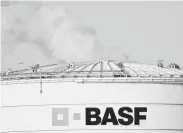 ?? Uwe Anspach / AFP / Getty Images ?? German chemical giant BASF said it will slash 6,000 jobs worldwide as it pursues fatter margins.