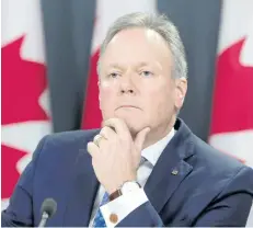  ?? CANADIAN PRESS FILES ?? Bank of Canada governor Stephen Poloz listens during a news conference in Ottawa, Jan. 18. The central bank announced that it would maintain its target for the overnight interest rate at 0.5 per cent.