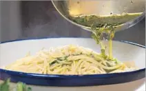  ?? Myung J. Chun Los Angeles Times ?? MASTER the art of preparing pasta al dente, then serve it as aglio e olio, a simple yet satisfying dish with few ingredient­s.