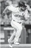  ?? Steve Gonzales / Staff photograph­er ?? Astros second baseman Jack Mayfield went 1-for-4 with an RBI during his major league debut on Monday.