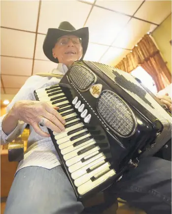  ?? DAVE SCHERBENCO/AP ?? John “Stanky” Stankovic holds his accordion in Nanticoke, Luzerne County.