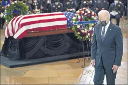  ?? J. SCOTT APPLEWHITE — THE ASSOCIATED PRESS ?? President Joe Biden walks from the podium during a ceremony to honor slain U.S. Capitol Police officer William “Billy” Evans at the Capitol in Washington on Tuesday. Evans lies in honor in the Capitol Rotunda.