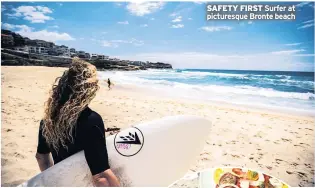  ??  ?? SAFETY FIRST Surfer at picturesqu­e Bronte beach