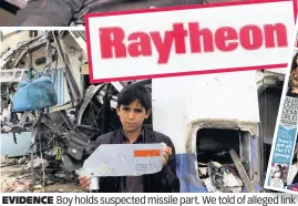  ??  ?? EVIDENCE Boy holds suspected missile part. We told of allegedged link