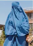  ?? Foto: dpa ?? Eine Frau in der Burka. In Marokko wird die Herstellun­g verboten.