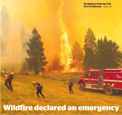  ?? Photo / AP ?? Firefighte­rs battle the Oak Fire in California.