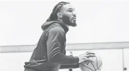  ?? MIAMI HEAT COURTESY ?? Forward Jae Crowder works on his shooting during the Heat’s camp at Disney World.