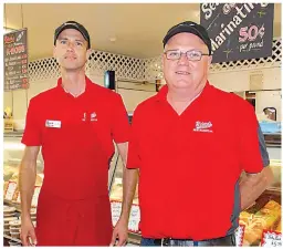  ??  ?? Richard McGinnis and son Chris operate Richard’s Country Meat Market, a longtime family owned business in Fayettevil­le.