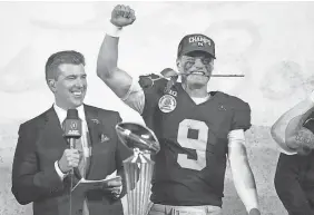  ?? KIRBY LEE/ USA TODAY SPORTS ?? Michigan QB J.J. McCarthy celebrates after defeating Alabama in the 2024 Rose Bowl CFP semifinal.