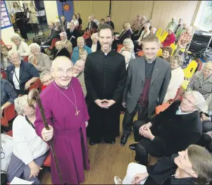 ??  ?? COMMUNITY LIFE: From left, Bishop of Jarrow, the Right Rev Mark Bryant,
with ordinands’ Michael Volland and Mark Tanner, with the parishione­rs.