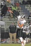  ?? Steven Eckhoff ?? Coosa quarterbac­k Hayden McBurnett attempts a pass during a region game against the Gordon Central Warriors on Friday at Gordon Central High School.