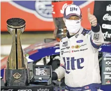  ?? AP PHOTO/GERRY BROOME ?? Brad Keselowski celebrates after winning the NASCAR Cup Series race at Charlotte Motor Speedway early Monday in Concord, N.C. Keselowski will lead the field at the start of today’s 3:30 p.m. Cup race on FS1.