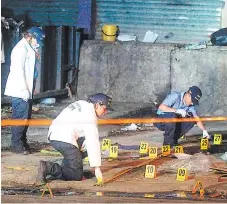  ?? FOTO: EL HERALDO ?? Los fallecidos se dedicaban a la recolecció­n de basura en el mercado Guamilito, en San Pedro Sula.