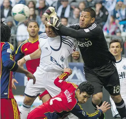  ?? LES BAZSO/ PNG ?? Vancouver Whitecaps Camilo Sanvezzo tries a header versus Real Salt Lake Nick Rimando during second- half MLS action at BC Place on Saturday. The ’ Caps are winless in four after having back- to- back victories after the opening of the season.