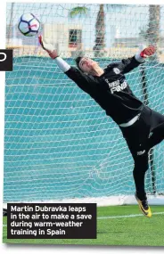  ??  ?? Martin Dubravka leaps in the air to make a save during warm-weather training in Spain