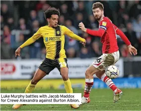  ?? ?? Luke Murphy battles with Jacob Maddox for Crewe Alexandra against Burton Albion.